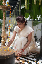Red kara and golden kasavu set mundu