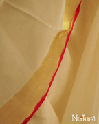 GOLDEN KASAVU WITH RED KARA BORDER