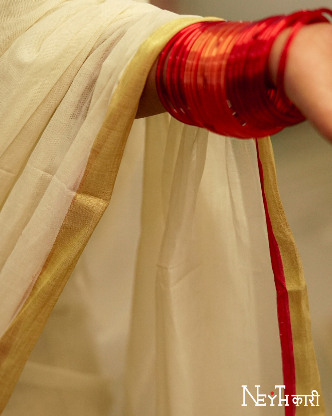 GOLDEN KASAVU WITH RED KARA BORDER 6
