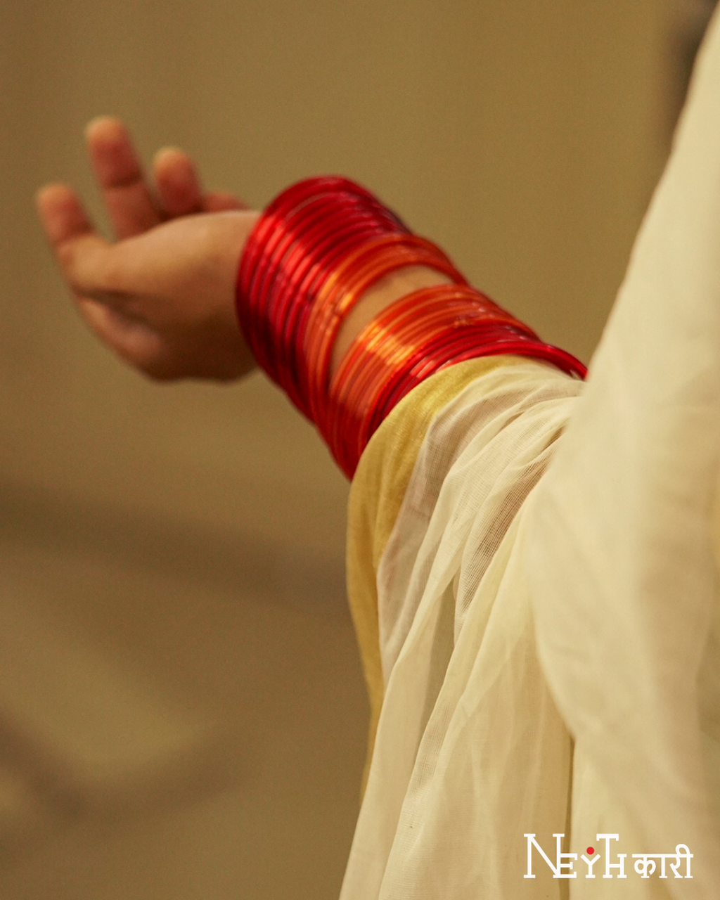 GOLDEN KASAVU WITH RED KARA BORDER 13